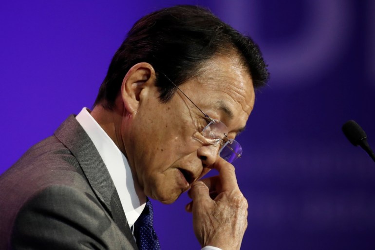 Japanese Finance Minister Taro Aso delivers a speech during a high-level forum on debt at the Finance Ministry in Paris, France, May 7, 2019. REUTERS/Benoit Tessier