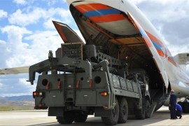 epa07712330 A handout photo made available by Turkish Defence Ministry press office shows Russian military cargo planes carrying some part of the Russian S-400 anti-aircraft missile system purchased from Russia after arriving to Turkey at the Akincilar airbase in Ankara, Turkey, 12 July 2019. NATO intended to stop Turkey from purchasing S-400 missiles from Russia, and recommended to rather buy US-made systems. Washington threatened to sanction Turkey and expel it from i
