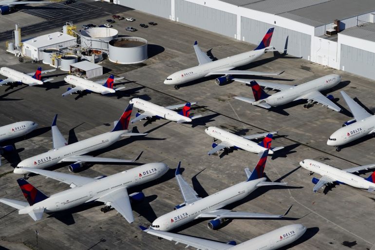 Delta Air Lines passenger planes are seen parked due to flight reductions made to slow the spread of coronavirus disease (COVID-19), at Birmingham-Shuttlesworth International Airport in Birmingham, Alabama, U.S. March 25, 2020. REUTERS/Elijah Nouvelage
