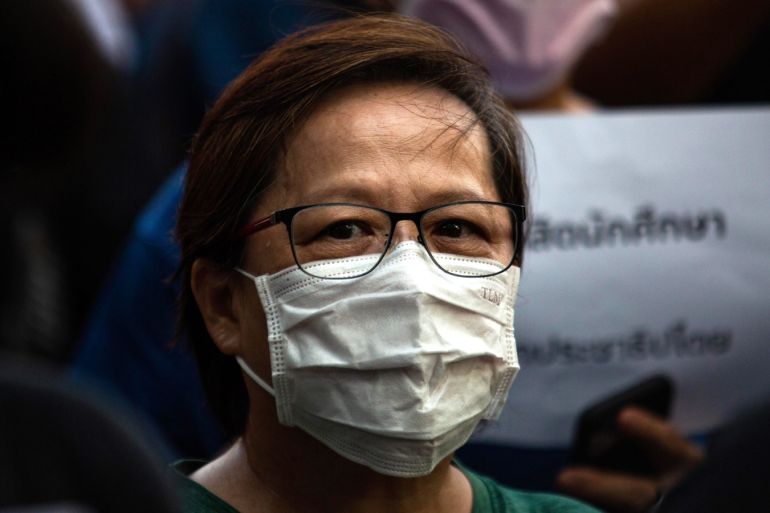 BلANGKOK, THAILAND - FEBRUARY 29: Thai people, wearing surgical masks, protest against the government amidst the global spread of the coronavirus at Kasetsart University February 29, 2020 in Bangkok, Thailand. Thailand's Constitutional Court last week ordered the dissolution of the popular Future Forward Party, after finding the party guilty of violating election law by accepting a loan from its founder. The Future Forward Party acted as the opposition to the Thai mil