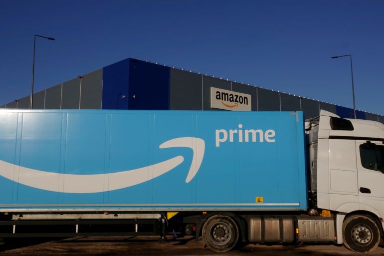 The logo of Amazon Prime Delivery is seen on the trailer of a truck outside the company logistics center in Lauwin-Planque, northern France, December 30, 2019. Picture taken December 30, 2019. REUTERS/Pascal Rossignol