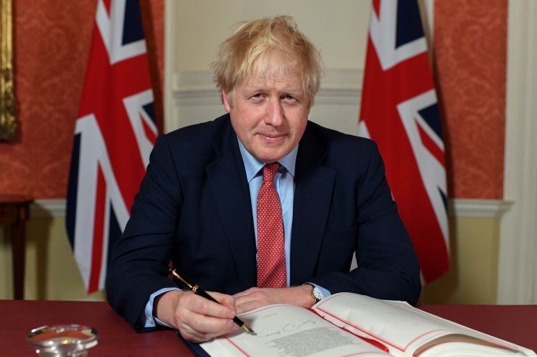 British PM Johnson signs Brexit withdrawal agreement- - LONDON, UNITED KINGDOM - JANUARY 24 : (----EDITORIAL USE ONLY –MANDATORY CREDIT -