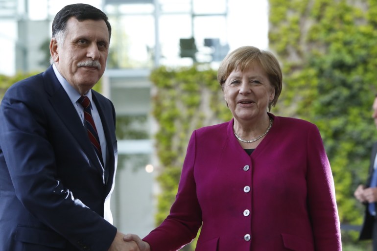 BERLIN, GERMANY - MAY 07: German Chancellor Angela Merkel (CDU), welcomes Libyan Prime Minister Fayez Al Sarraj in the courtyard of the Chancellery on May 7, 2019 in Berlin, Germany. (Photo by Michele Tantussi/Getty Images)