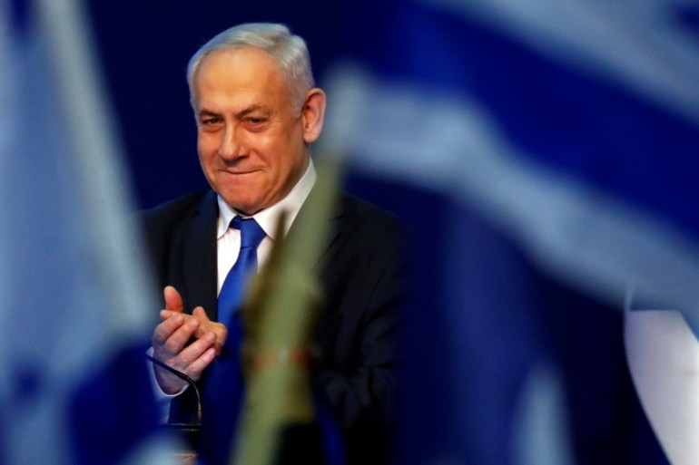 Israeli Prime Minister Benjamin Netanyahu reacts upon his arrival to address his supporters following the announcement of exit polls in Israel's election at his Likud party headquarters in Tel Aviv, Israel March 3, 2020. REUTERS/Amir Cohen