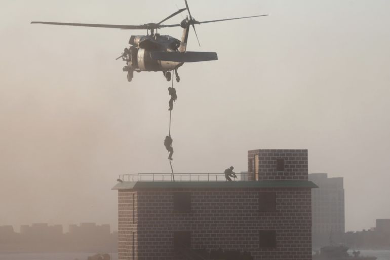 Members of the United Arab Emirates Armed Forces perform military drills during the