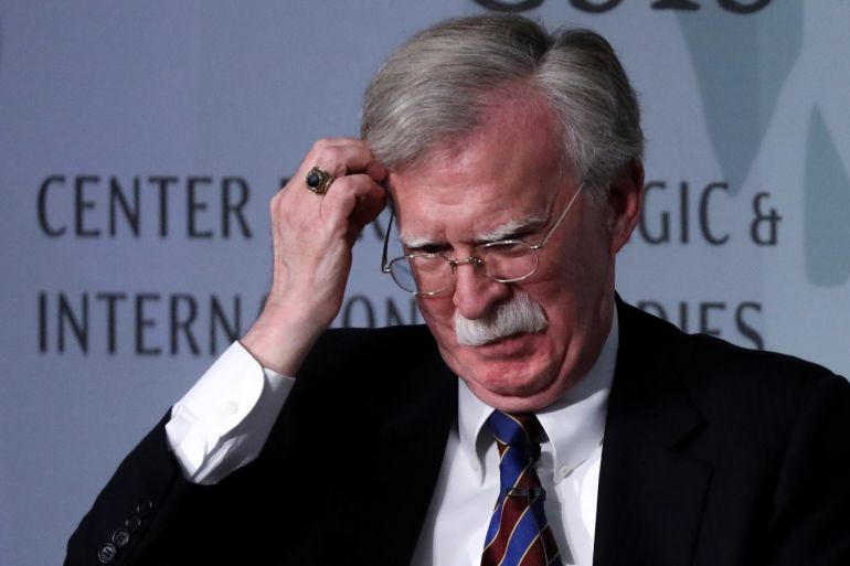 White House former National Security Advisor John Bolton fixes his hair and listens to a question after his remarks on North Korea at the Center for Strategic and International Studies (CSIS) think tank in Washington, U.S. September 30, 2019. REUTERS/Jonathan Ernst