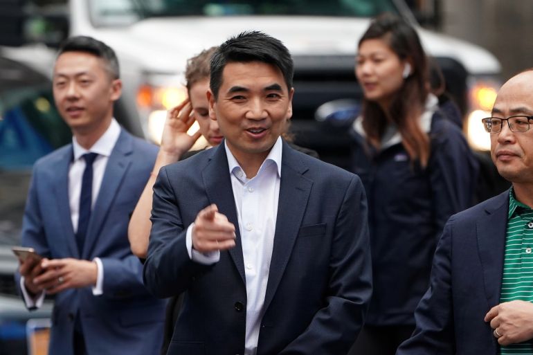 Eric Yuan, CEO of Zoom Video Communications walks on the street as he takes part in a bell ringing ceremony at the NASDAQ MarketSite in New York, New York, U.S., April 18, 2019. REUTERS/Carlo Allegri