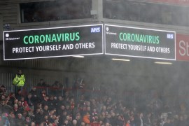 Soccer Football - Premier League - Liverpool v AFC Bournemouth - Anfield, Liverpool, Britain - March 7, 2020 General view of a sign providing information amid concern following the coronavirus outbreak inside the stadium during the match Action Images via Reuters/Carl Recine EDITORIAL USE ONLY. No use with unauthorized audio, video, data, fixture lists, club/league logos or