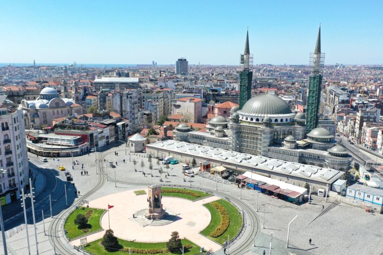 Coronavirus silence in squares of Istanbul- - ISTANBUL, TURKEY - APRIL 09: An aerial view of empty Taksim Square is seen as people are staying home due to the coronavirus (COVID-19) pandemic in Istanbul, Turkey on April 09, 2020.
