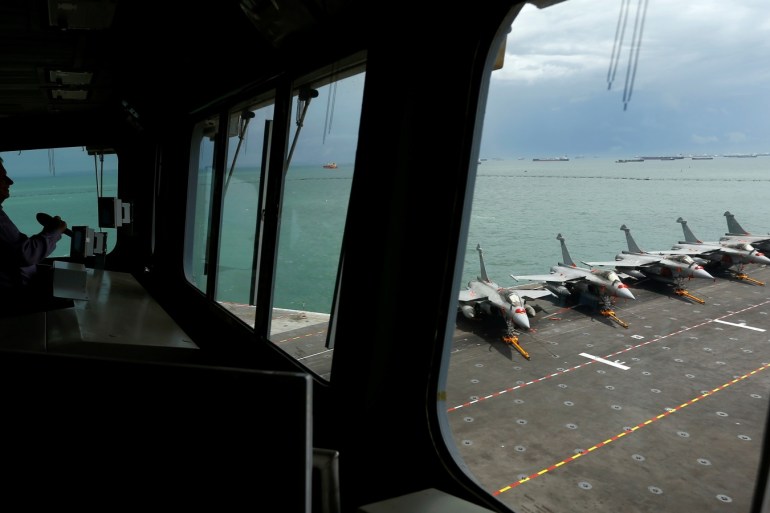 French Navy Rafale fighter jets are seen from the bridge of the aircraft carrier Charles de Gaulle at Changi Naval Base in Singapore, May 28, 2019. REUTERS/Feline Lim