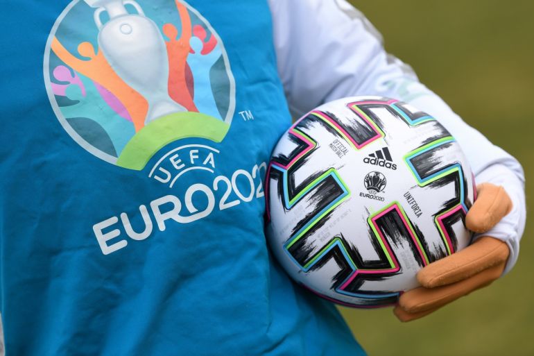 UEFA Euro 2020 mascot Skillzy poses for a photo with the official match ball at Olympiapark in Munich, Germany, March 3, 2020. REUTERS/Andreas Gebert