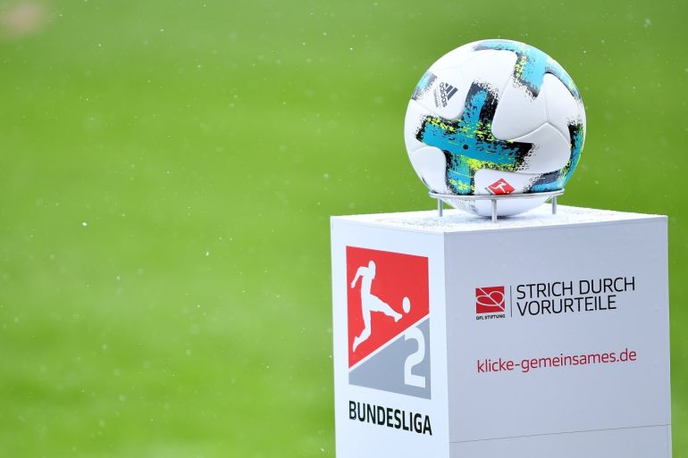 INGOLSTADT, GERMANY - MARCH 18: The Second Bundesliga logo is seen with the match ball and the campaign Strich durch Vorurteile during the Second Bundesliga match between FC Ingolstadt 04 and SG Dynamo Dresden at Audi Sportpark on March 18, 2018 in Ingolstadt, Germany. (Photo by Sebastian Widmann/Bongarts/Getty Images)