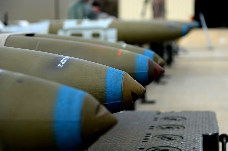 A row of Guided Bomb Unit 32s lie on a munitions assembly conveyer at Langley Air Force Base Virginia