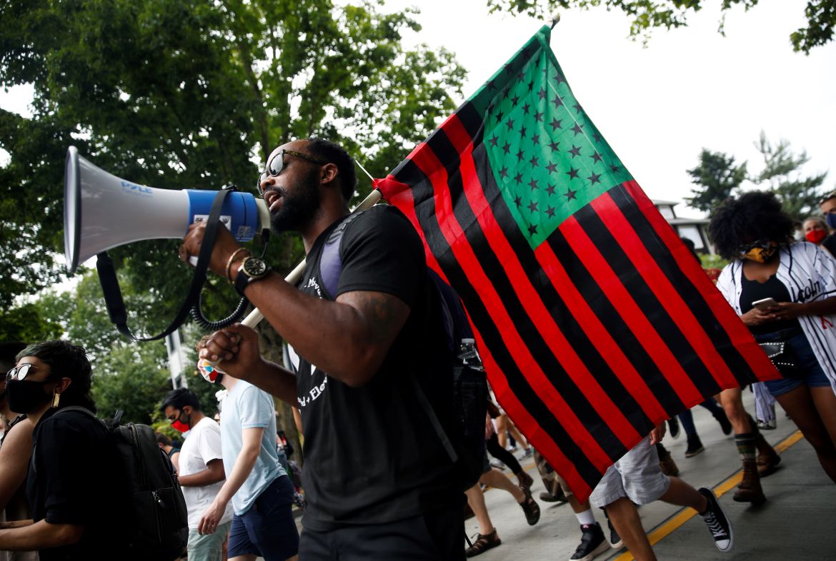 People participate in a Juneteenth Freedom March to mark Juneteenth in Seattle