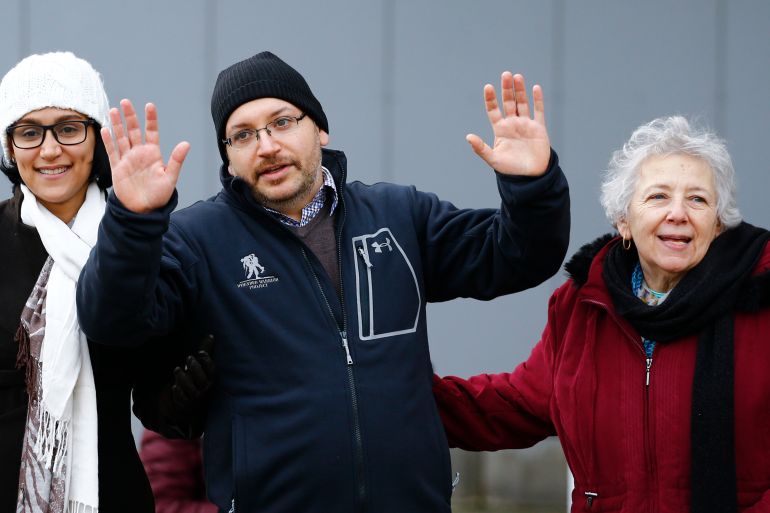 Rezaian one of the U.S. citizens recently released from detention in Iran waves to media outside the Emergency Room of the LRMC in the southwestern town of Landstuhl