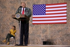 U.S. President Trump delivers remarks to U.S. troops in an unannounced visit to Al Asad Air Base, Iraq