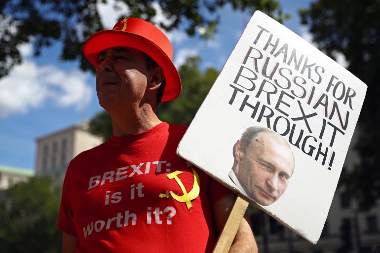 Anti-Brexit demonstrator Steve Bray holds a placard as he protests outside Downing Street in London