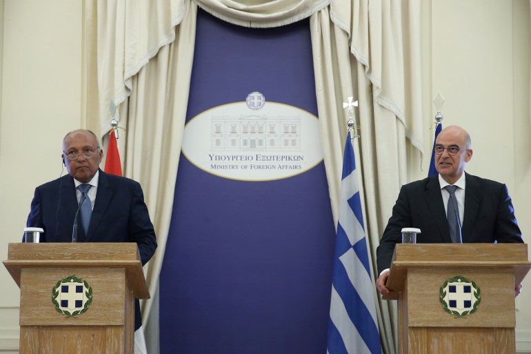 Greek Foreign Minister Nikos Dendias addresses journalists during a joint press conference with his Egyptian counterpart Sameh Shoukry following a meeting at the Foreign Ministry in Athens