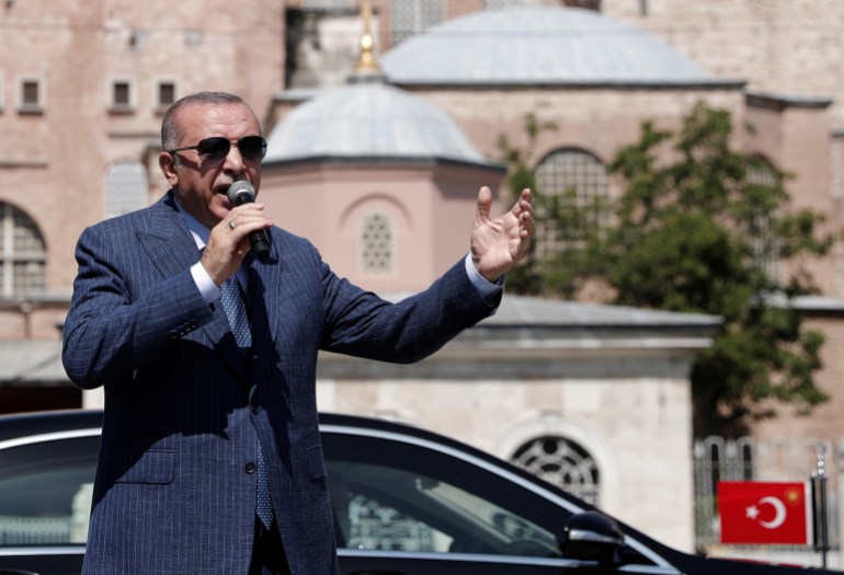 Turkish President Erdogan talks to the media after attending Friday prayers at Hagia Sophia Grand Mosque in Istanbul