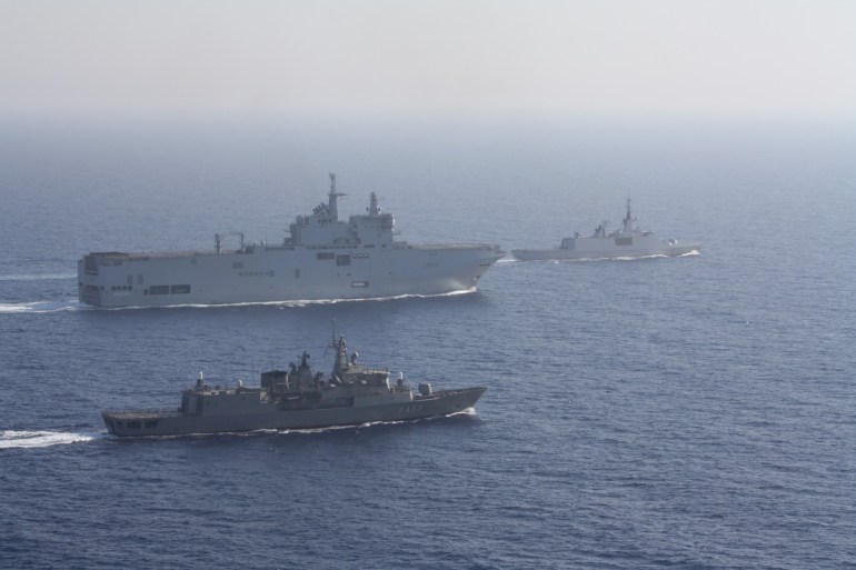 Greek and French vessels sail in formation during a joint military exercise in Mediterranean sea