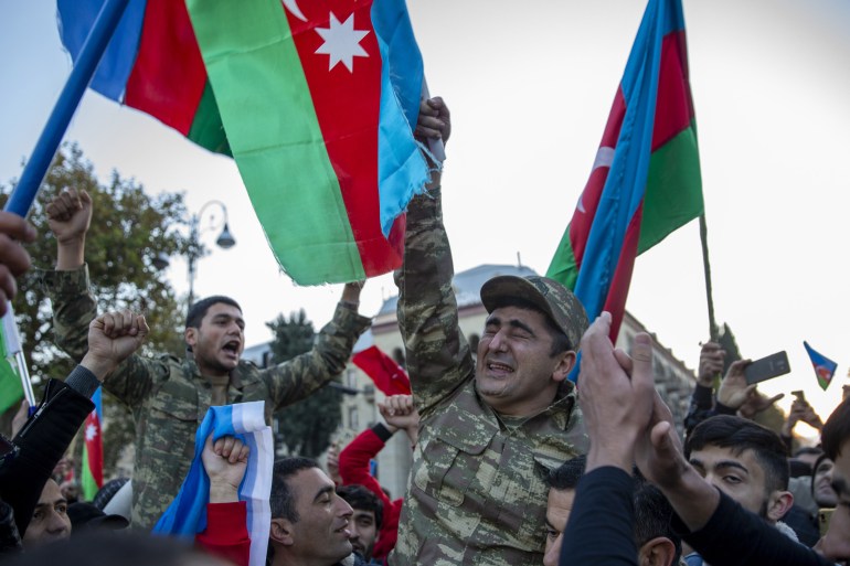 Azerbaijanis celebrate the deal reached on Nagorno-Karabakh