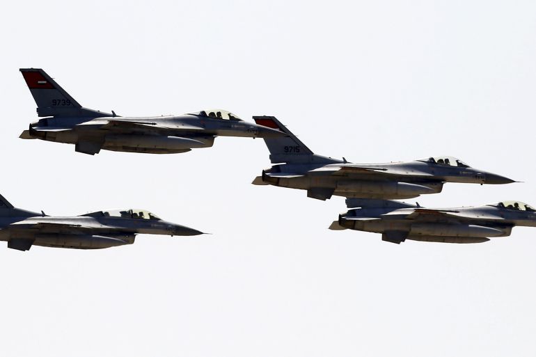 Egyptian air force planes parade during inauguration ceremony of new Suez Canal, in Ismailia