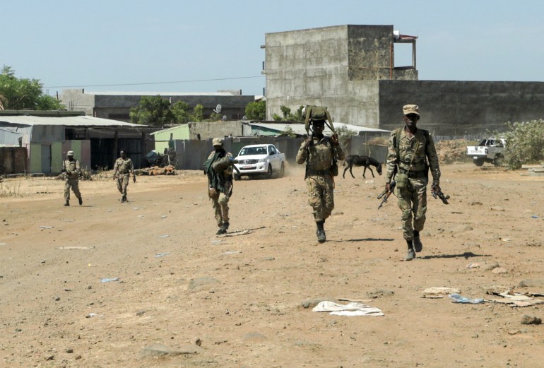 Members of the Amhara Special Force return to the Dansha Mechanized 5th division Military base after fighting against the Tigray People's Liberation Front (TPLF), in Danasha, Amhara region near a border with Tigray