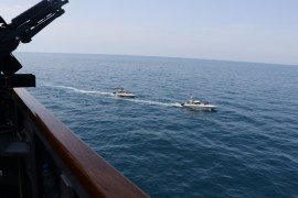 Two Iranian Islamic Revolutionary Guard Corps Navy vessels alongside U.S. Naval Forces in the Gulf