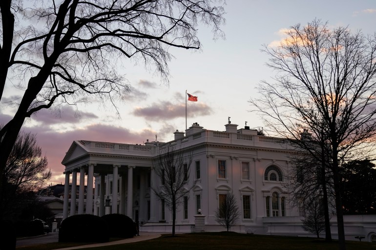 The White House is seen at sunrise during U.S. President Joe Biden's first week in office in Washington
