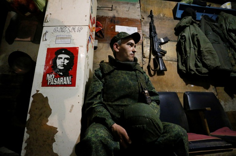 A militant of the self-proclaimed Luhansk People's Republic is seen at frontline positions in Luhansk Region