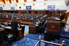Malaysia's members of parliament attend a session of the lower house of parliament, in Kuala Lumpur