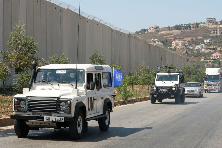 UN peacekeepers (UNIFIL) vehicles drive in Adaisseh village, near the Lebanese-Israeli border
