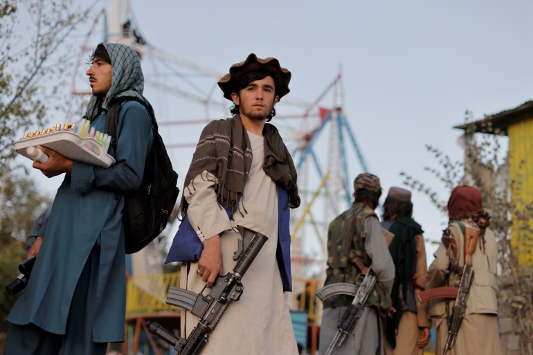 Taliban fighters flock to Kabul recreation spot for a day off