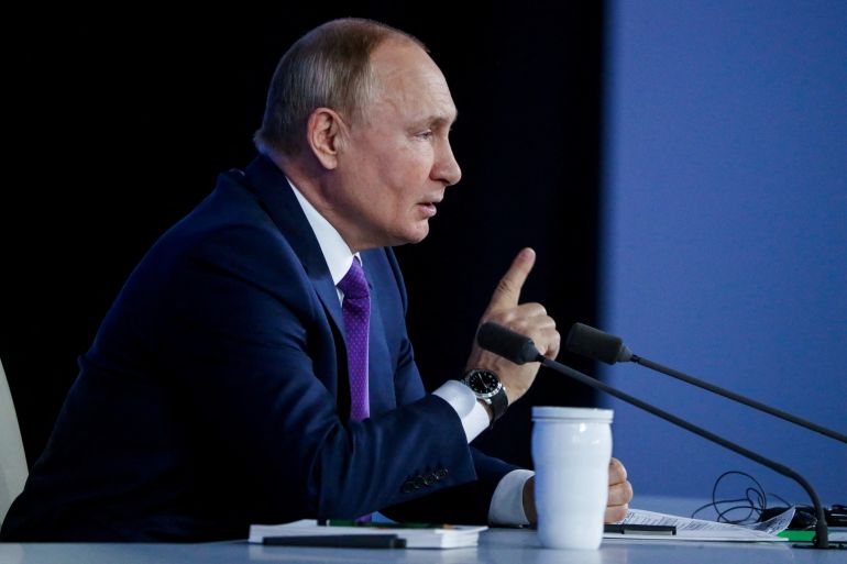 Russian President Putin attends a news conference in Moscow