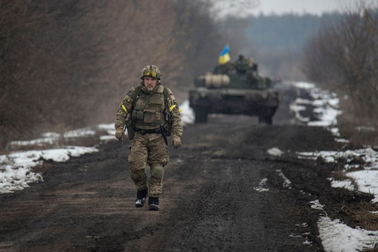 A Ukrainian serviceman is seen in the Sumy region